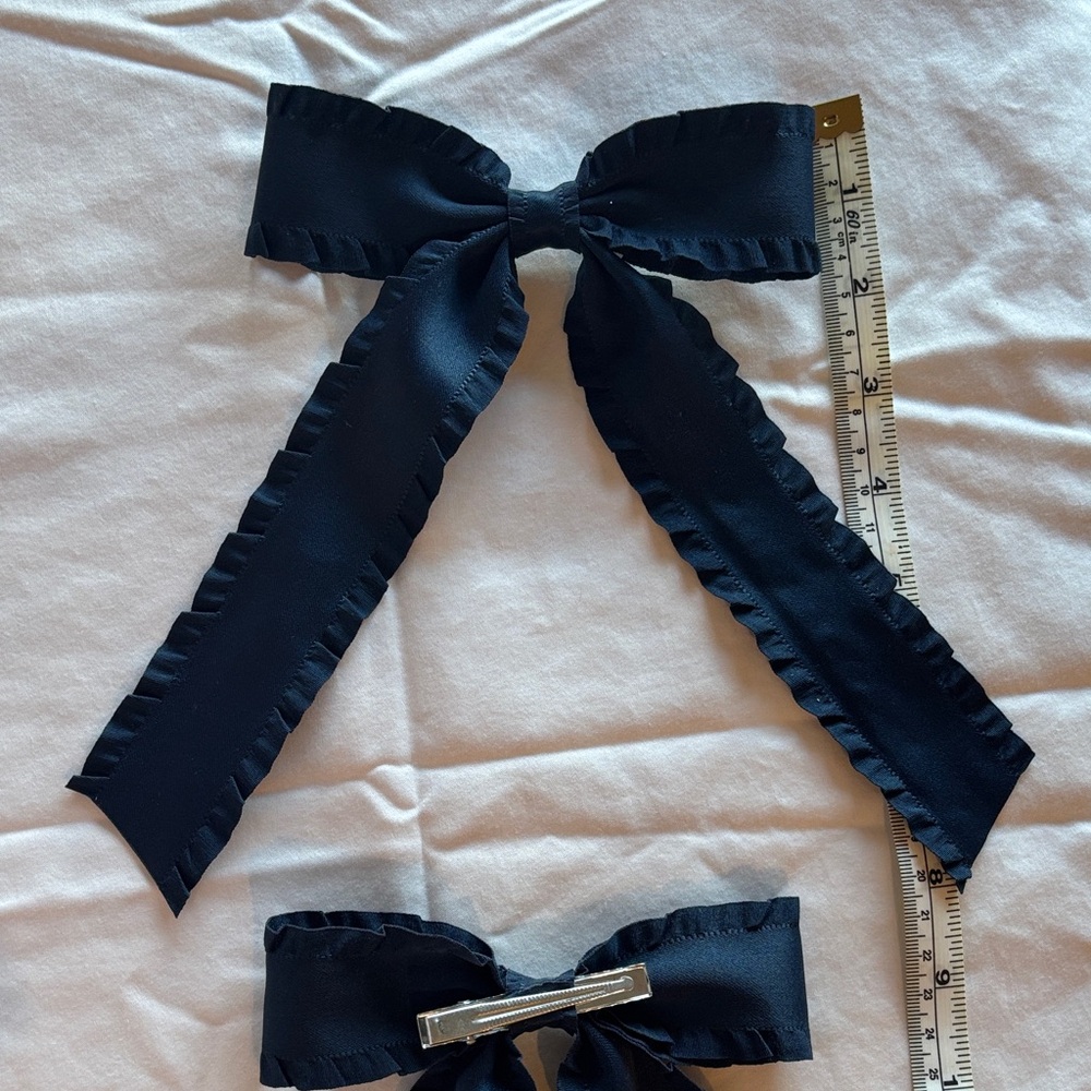 2 navy blue hair bows with clips